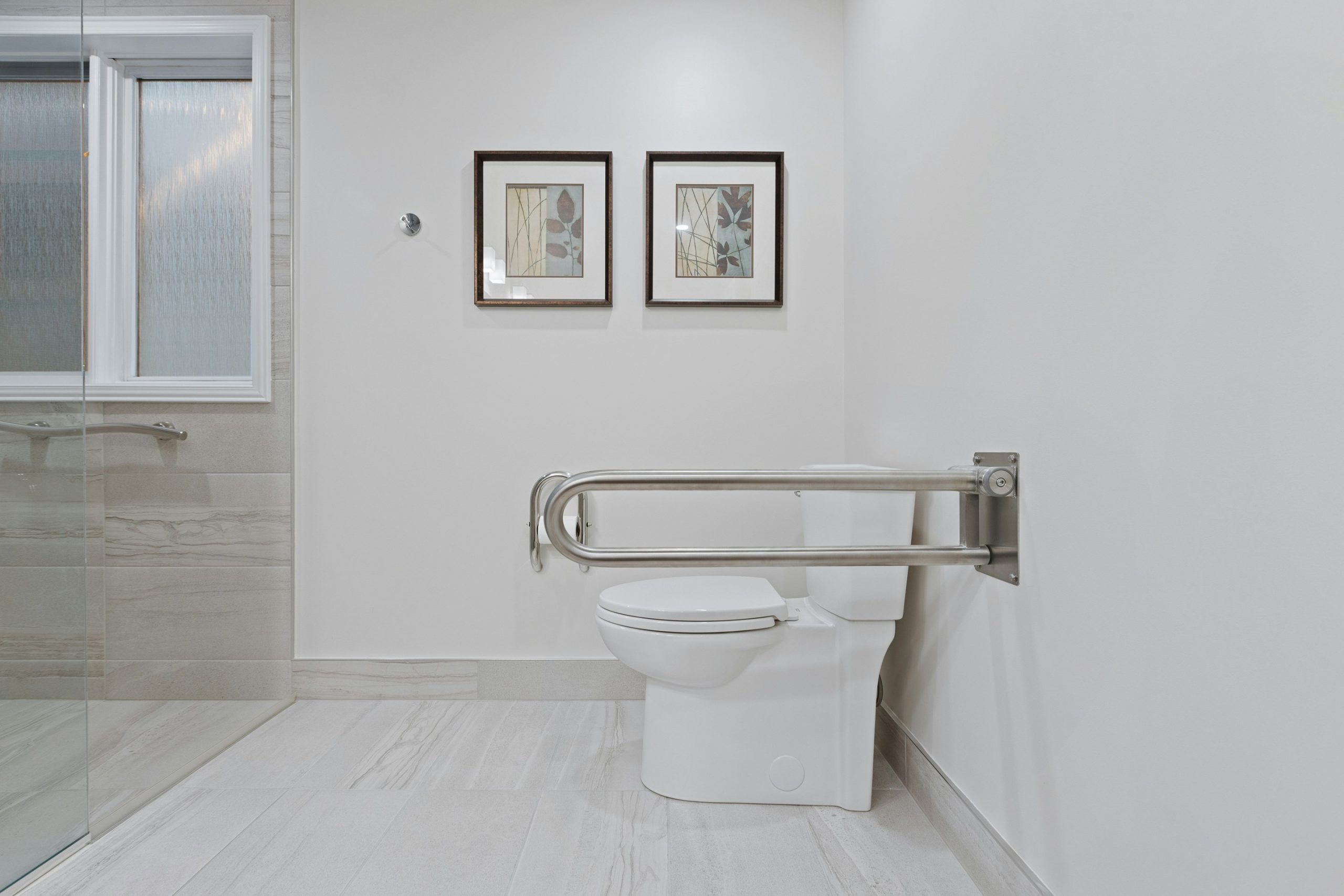a bathroom with a toilet and a bathtub